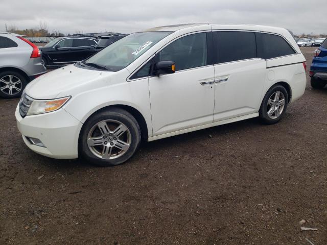 HONDA ODYSSEY TO 2012 with VIN 5FNRL5H94CB075059 - Photo from auction