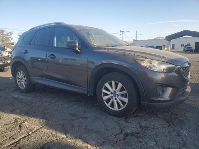 Photo 4 from auction – 2014 MAZDA CX-5 TOURI with VIN JM3KE2CY8E0322679