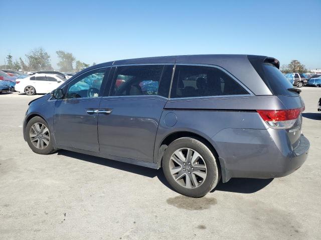 Photo 2 from auction – 2014 HONDA ODYSSEY TO with VIN 5FNRL5H94EB133092