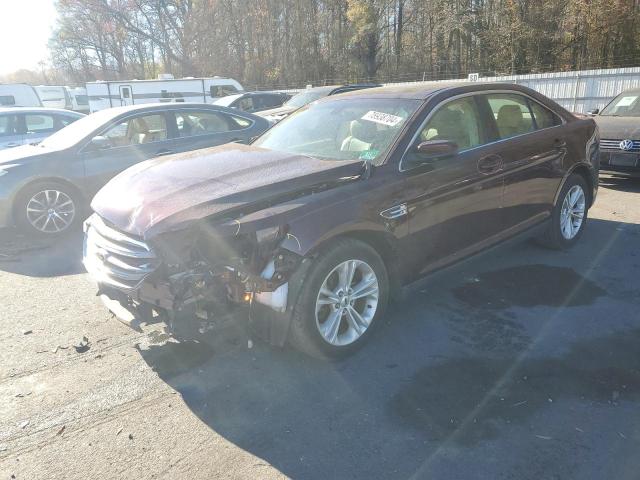 FORD TAURUS SEL 2018 with VIN 1FAHP2E88JG119275 - Photo from auction