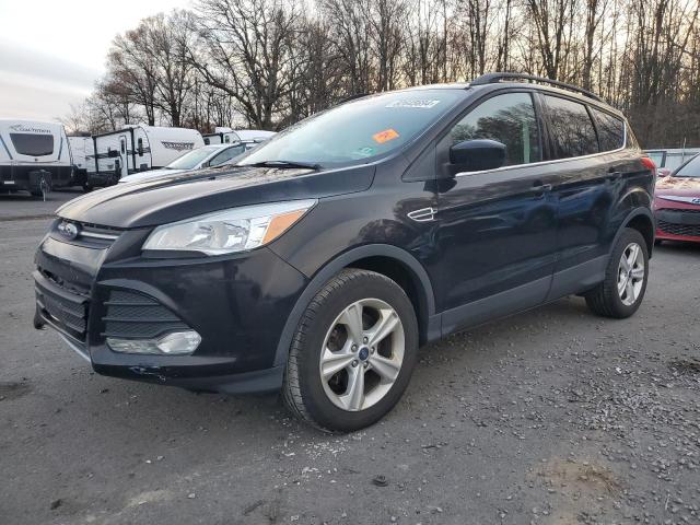 FORD ESCAPE SE 2016 with VIN 1FMCU9GX5GUC71451 - Photo from auction