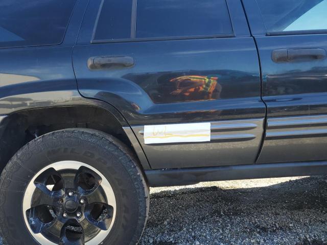 Photo 12 from auction – 2004 JEEP GRAND CHER with VIN 1J4GW48J44C336573