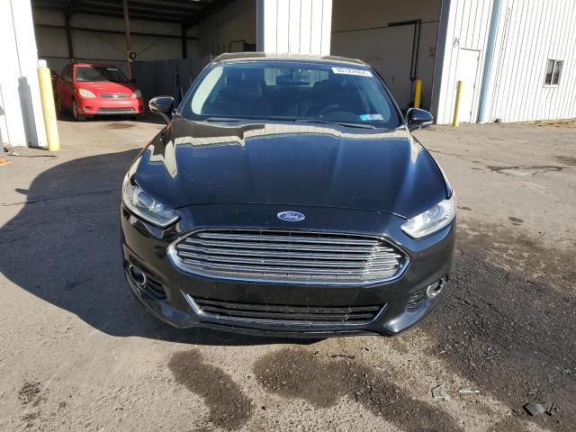 Photo 5 from auction – 2016 FORD FUSION TIT with VIN 3FA6P0D92GR210064