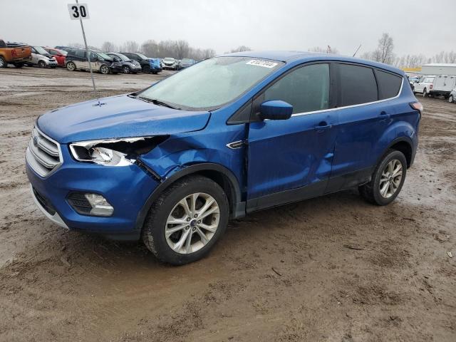 FORD ESCAPE SE 2017 with VIN 1FMCU9GD8HUC64808 - Photo from auction