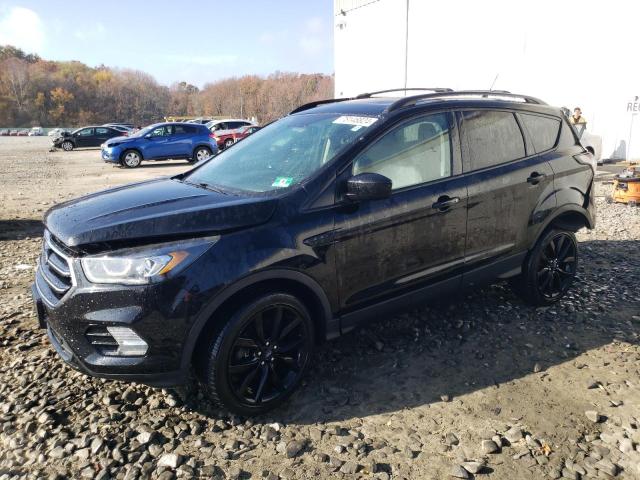 FORD ESCAPE SE 2018 with VIN 1FMCU9GD4JUC25574 - Photo from auction