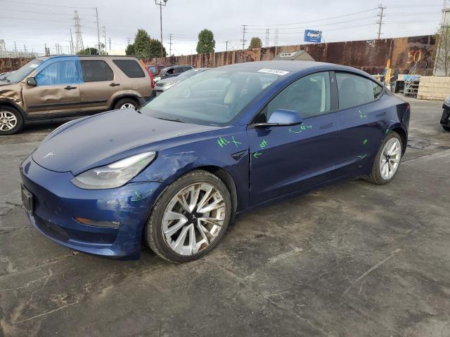 TESLA MODEL 3 2022 with VIN 5YJ3E1EB6NF143073 - Photo from auction