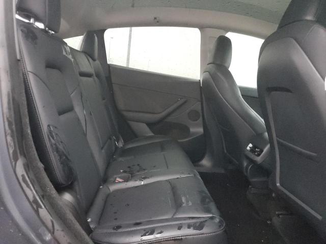 Photo 11 from auction – 2023 TESLA MODEL Y with VIN 7SAYGDED7PF960240