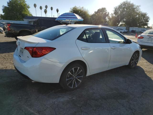 Photo 3 from auction – 2017 TOYOTA COROLLA L with VIN 5YFBURHE8HP596140