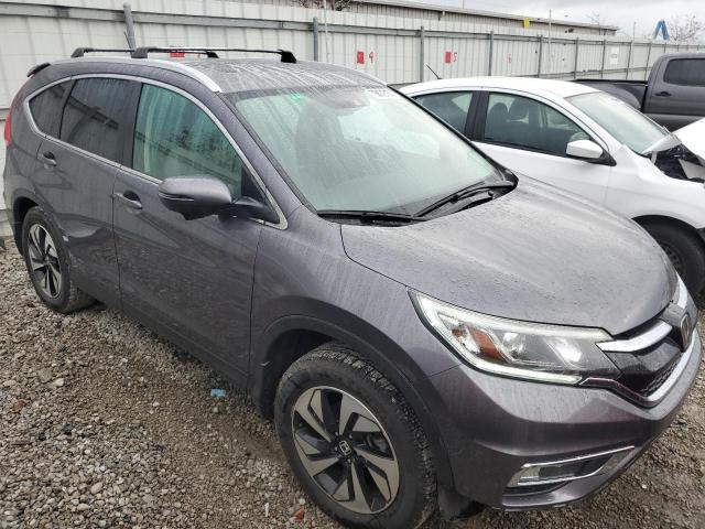 Photo 4 from auction – 2015 HONDA CR-V TOURI with VIN 5J6RM4H96FL076295