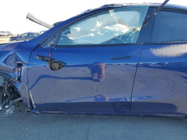 Photo 7 from auction – 2023 TESLA MODEL Y with VIN 7SAYGDEE7PF817135