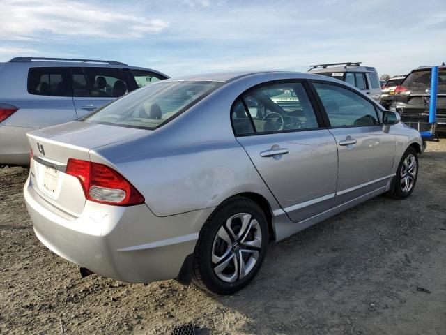 Photo 3 from auction – 2010 HONDA CIVIC LX with VIN 19XFA1F50AE013159