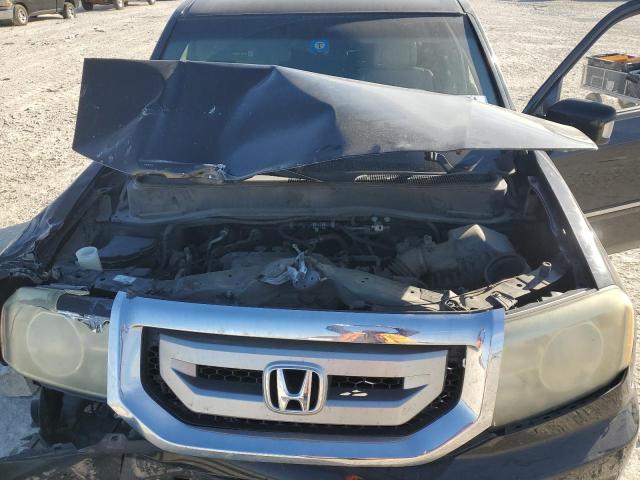Photo 12 from auction – 2011 HONDA PILOT TOUR with VIN 5FNYF3H94BB044559