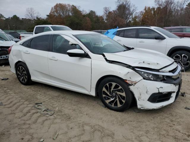 Photo 4 from auction – 2017 HONDA CIVIC LX with VIN 2HGFC2F50HH523057