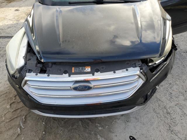 Photo 12 from auction – 2017 FORD ESCAPE SE with VIN 1FMCU0G92HUA28579