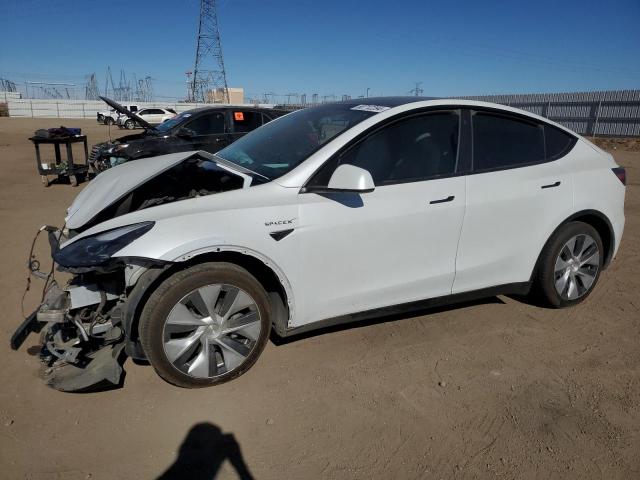 TESLA MODEL Y 2023 with VIN 7SAYGAEEXPF744308 - Photo from auction