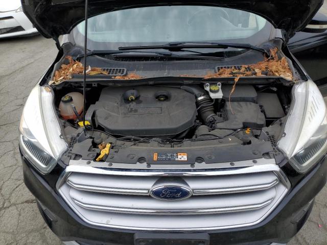 Photo 11 from auction – 2017 FORD ESCAPE TIT with VIN 1FMCU0J92HUC51441