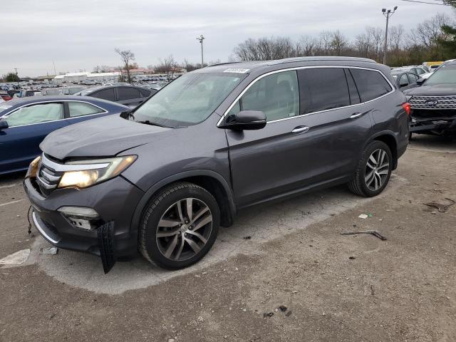 HONDA PILOT TOUR 2018 with VIN 5FNYF6H96JB024376 - Photo from auction