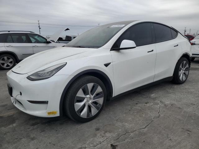 TESLA MODEL Y 2022 with VIN 7SAYGAEE8NF341506 - Photo from auction