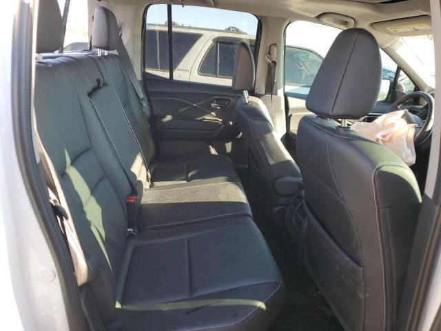 Photo 10 from auction – 2023 HONDA RIDGELINE with VIN 5FPYK3F56PB055086