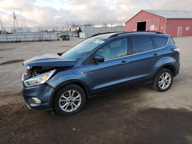 FORD ESCAPE SEL 2018 with VIN 1FMCU9HD5JUB63388 - Photo from auction