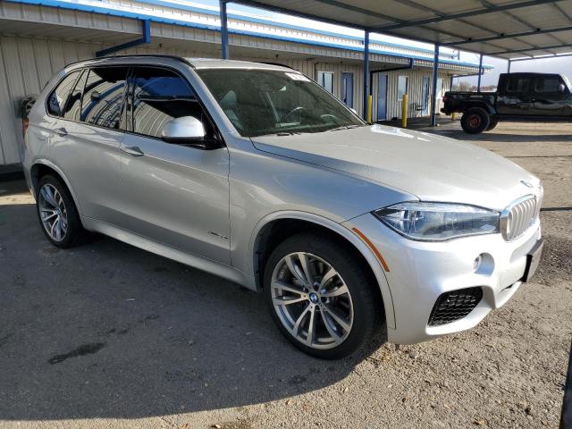 Photo 4 from auction – 2016 BMW X5 XDRIVE5 with VIN 5UXKR6C57G0J82099