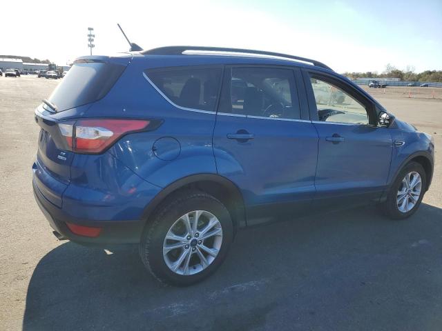 Photo 3 from auction – 2018 FORD ESCAPE SE with VIN 1FMCU9GD3JUA34454