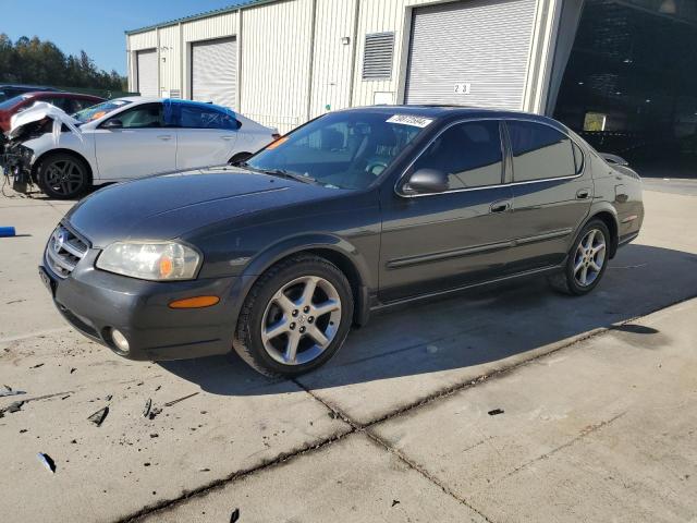 NISSAN MAXIMA GLE 2003 with VIN JN1DA31A73T406158 - Photo from auction