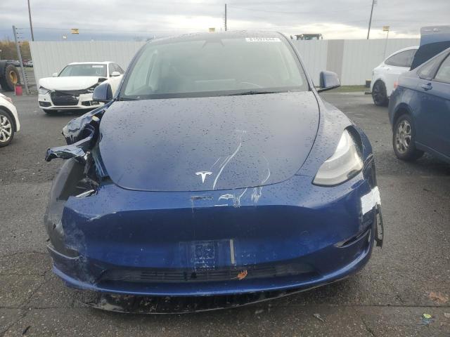 Снимка 5 от търг – 2022 TESLA MODEL Y с VIN 7SAYGDEF2NF400074