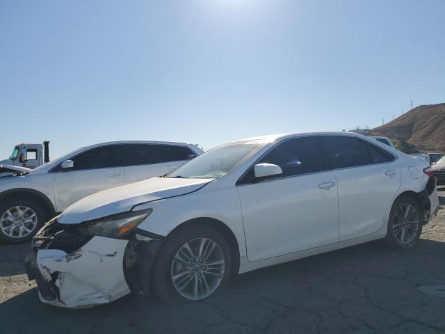 TOYOTA CAMRY LE 2016 with VIN 4T1BF1FK2GU226433 - Photo from auction