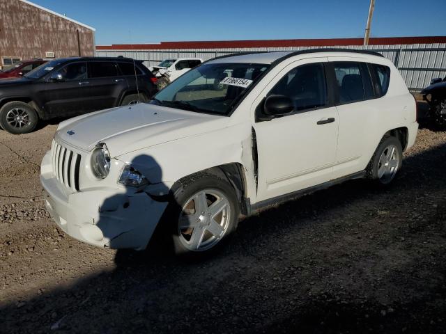 JEEP COMPASS SP 2010 with VIN 1J4NF4FB7AD503727 - Photo from auction