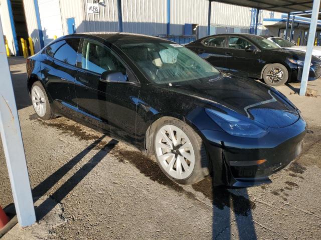 Photo 4 from auction – 2022 TESLA MODEL 3 with VIN 5YJ3E1EA9NF188631