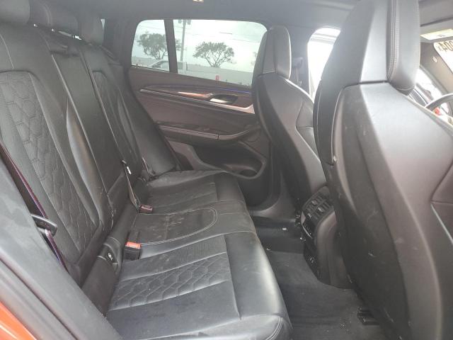 Photo 11 from auction – 2021 BMW X4 M COMPE with VIN 5YMUJ0C02M9F18326