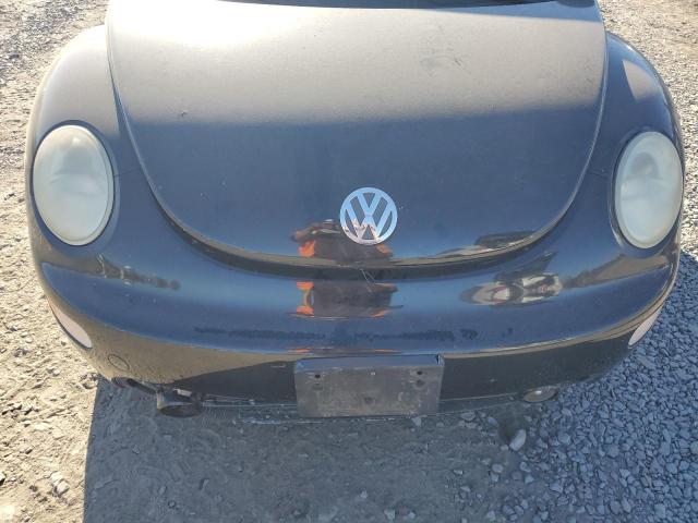 Photo 11 from auction – 2000 VOLKSWAGEN NEW BEETLE with VIN 3VWCC21C0YM404382