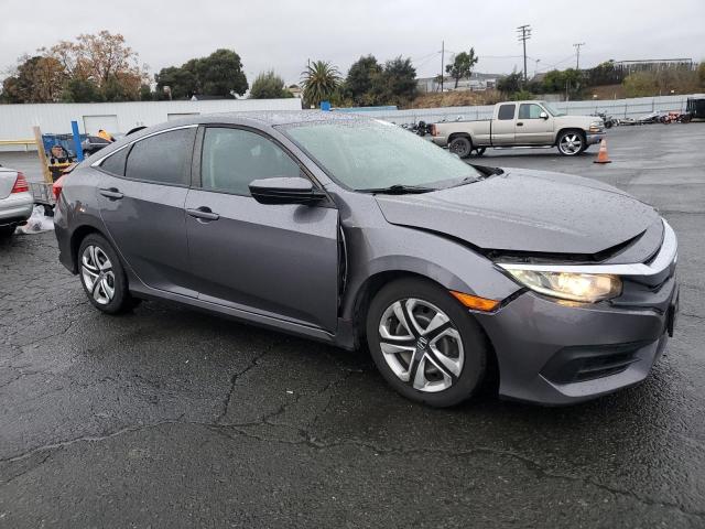 Photo 4 from auction – 2018 HONDA CIVIC LX with VIN 2HGFC2F55JH545383