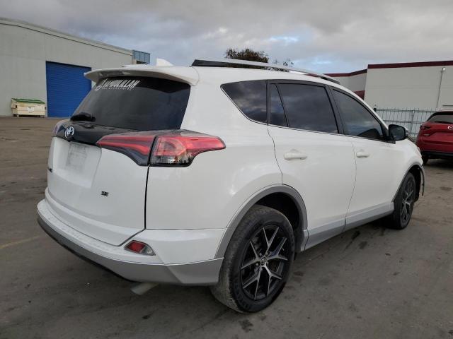 Photo 3 from auction – 2016 TOYOTA RAV4 SE with VIN JTMNFREV6GD092196