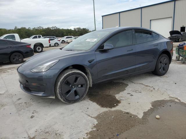TESLA MODEL 3 2023 with VIN 5YJ3E1EA5PF614799 - Photo from auction