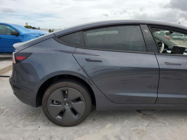 Photo 10 from auction – 2023 TESLA MODEL 3 with VIN 5YJ3E1EA5PF614799