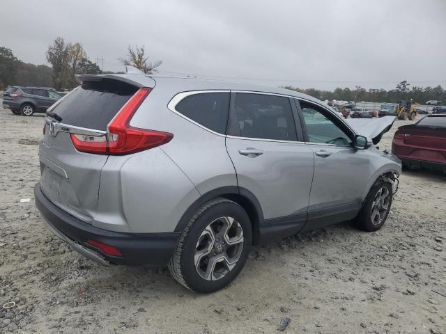 Photo 3 from auction – 2019 HONDA CR-V with VIN 7FARW1H87KE000110
