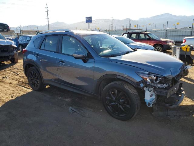 Photo 4 from auction – 2016 MAZDA CX-5 GT with VIN JM3KE4DY5G0734099