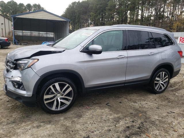 Photo 1 from auction – 2017 HONDA PILOT TOUR with VIN 5FNYF6H9XHB063675