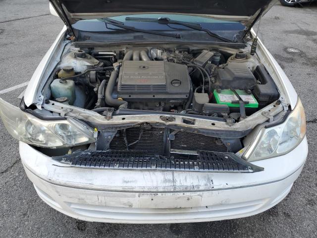 Photo 11 from auction – 2000 TOYOTA AVALON XL with VIN 4T1BF28B8YU021400
