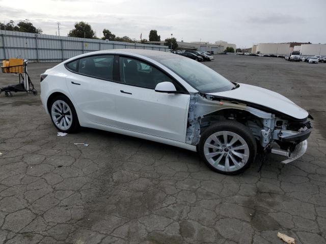 Photo 4 from auction – 2022 TESLA MODEL 3 with VIN 5YJ3E1EB8NF233891