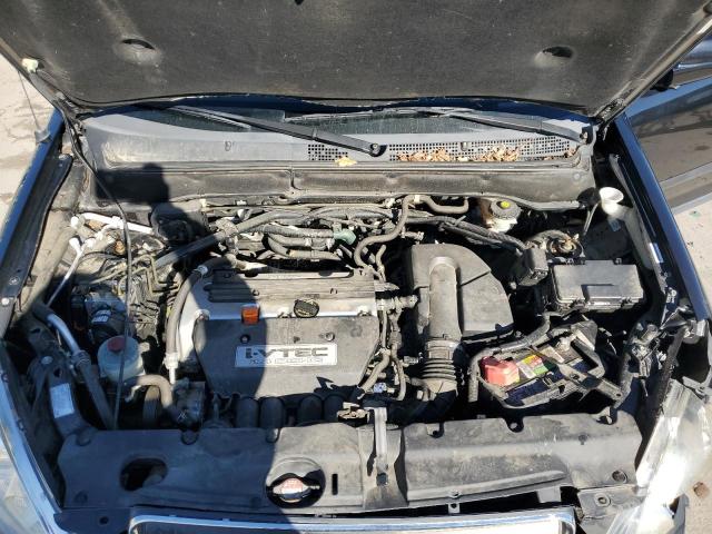 Photo 12 from auction – 2005 HONDA CR-V EX with VIN JHLRD78845C058619