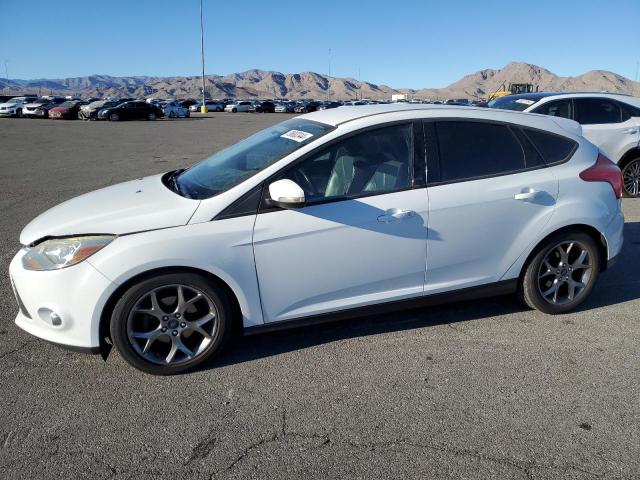 FORD FOCUS SE 2014 with VIN 1FADP3K28EL336424 - Photo from auction