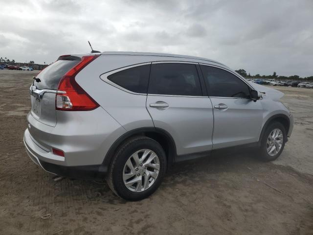 Photo 3 from auction – 2016 HONDA CR-V EXL with VIN 2HKRM3H72GH564812