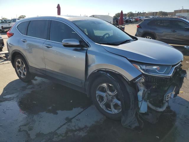 Photo 4 from auction – 2018 HONDA CR-V EXL with VIN 7FARW1H89JE034709