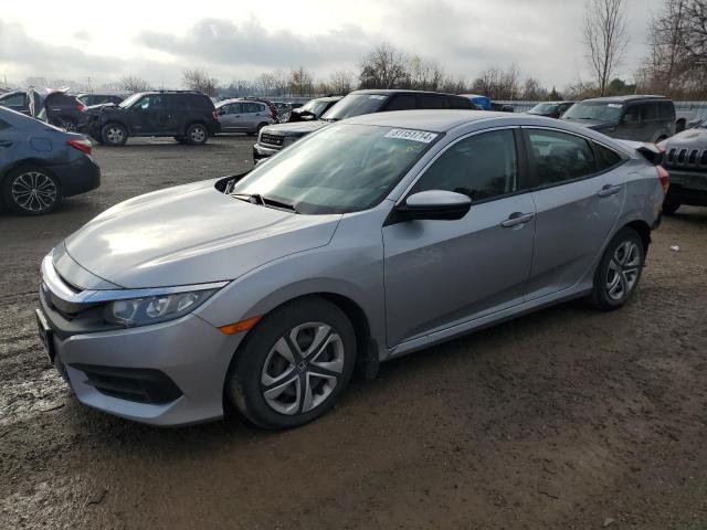 HONDA CIVIC LX 2018 with VIN 2HGFC2F53JH041334 - Photo from auction