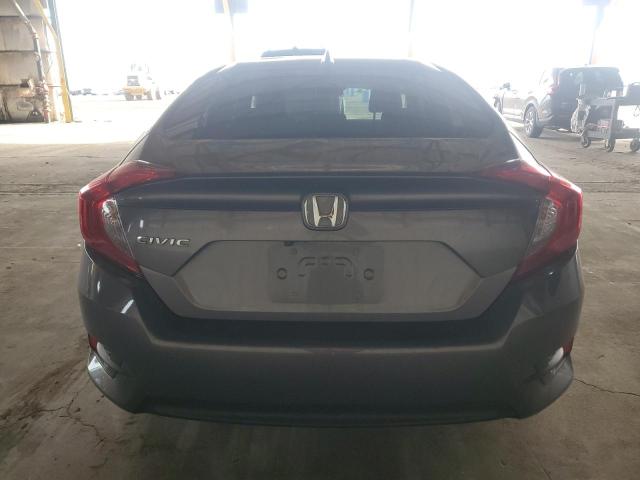 Photo 6 from auction – 2018 HONDA CIVIC EX with VIN 19XFC2F73JE204950