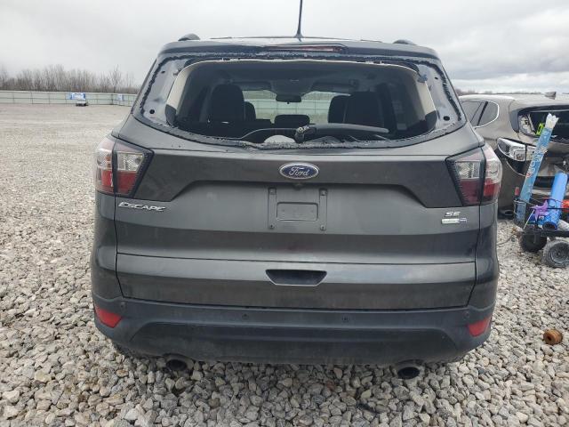 Photo 6 from auction – 2018 FORD ESCAPE SE with VIN 1FMCU9GD2JUA77344