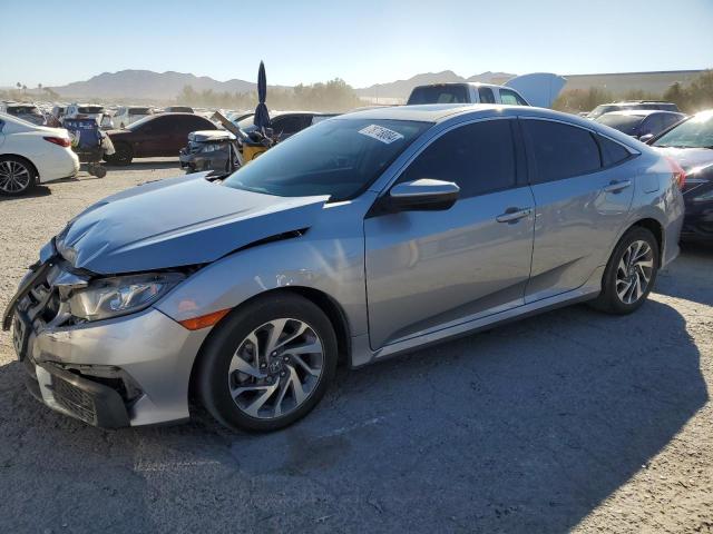 HONDA CIVIC EX 2017 with VIN 2HGFC2F74HH500527 - Photo from auction